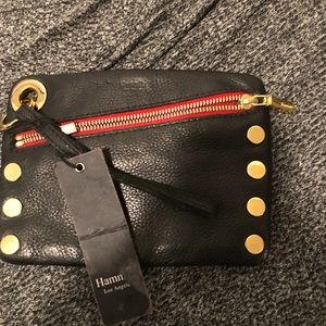 NWT bHAMMITT
Nash Small Clutch, Black & Brushed Gold with Red Zipper